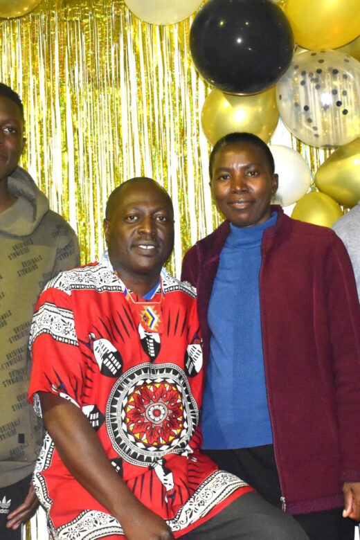 Sydney & Misozi Mhango with their sons Benjamin & Mluleki at the celebration for Mhango's 20 years.